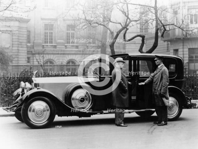 Rolls Royce with chauffeur. Artist: Unknown