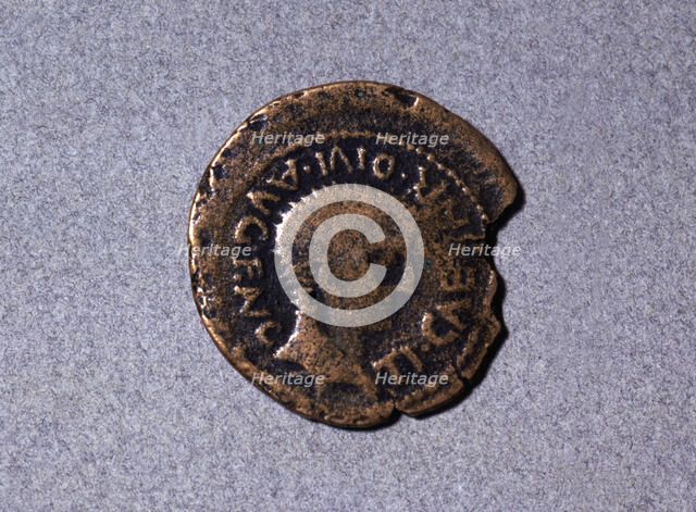 Roman coin from the first half of the first century AC, with a head facing right and the legend '…