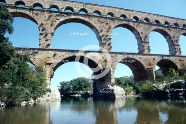 Roman aqueduct in Pont du Gard, France, 1st century. Artist: CM Dixon.