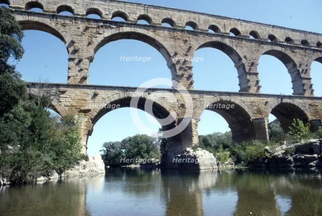 Roman aqueduct in Pont du Gard, France, 1st century. Artist: CM Dixon.