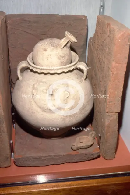 Roman Burial (Cremation) in a face urn, Colchester, Essex c125-200. Artist: Unknown.