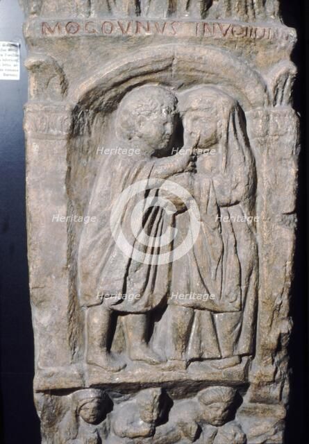 Roman doctor inspecting eye of a woman, relief on gravestone, from house near Naix, France. Artist: Unknown.