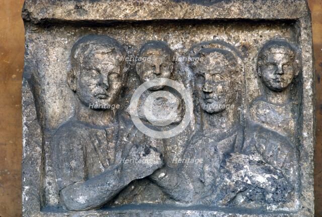 Roman Family on a grave-slab. Artist: Unknown.