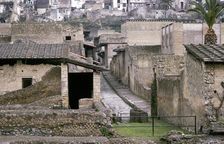 Roman houses of Herculaneum with the modern houses of Ercolano above, Italy