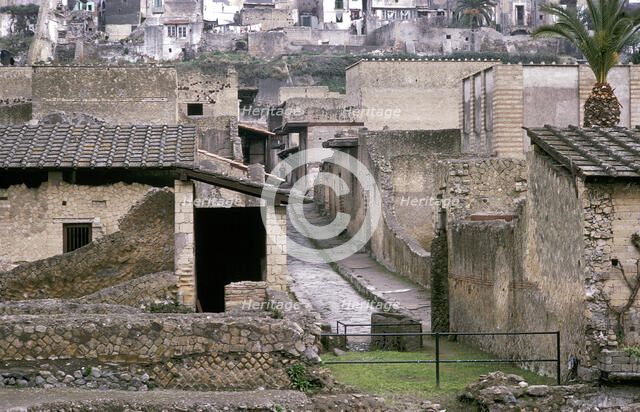 Roman houses of Herculaneum with the modern houses of Ercolano above, Italy. Artist: Unknown