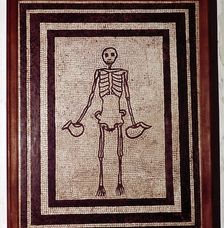 Roman mosaic of a skeleton, Pompeii, Italy