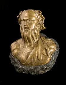 Roman steelyard weight in the form of a bearded satyr, found at Richborough Castle, Kent, 2012. Artist: Historic England Staff Photographer