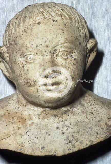 Roman Pipeclay Head of Child from Roman grave at Colchester, Essex, c2nd-3rd century. Artist: Unknown.