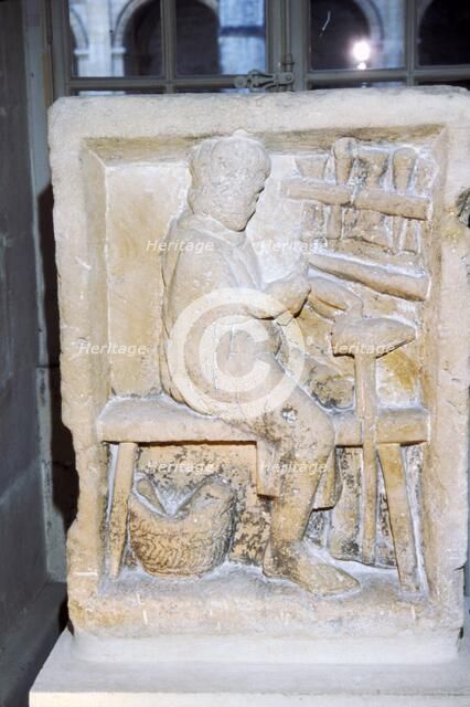 Roman relief of a shoe-maker or repairer from Rheims, France, c1st-2nd century. Artist: Unknown.