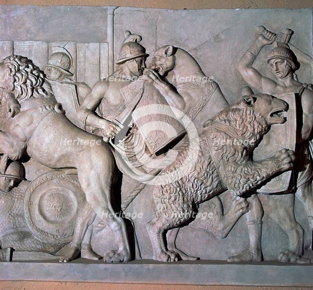 Roman relief of gladiators fighting wild beasts., 1st century. Artist: Unknown