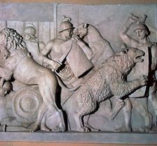Roman relief of gladiators fighting wild beasts., 1st century