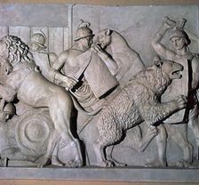 Roman relief of gladiators fighting wild beasts., 1st century
