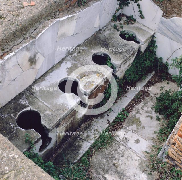 Roman toilet, Ostia, Italy. Artist: Unknown