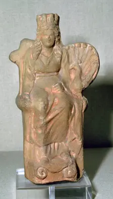 Roman terracotta figure of the goddess Juno, with a Peacock, 1st century