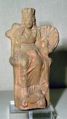 Roman terracotta figure of the goddess Juno, with a Peacock, 1st century