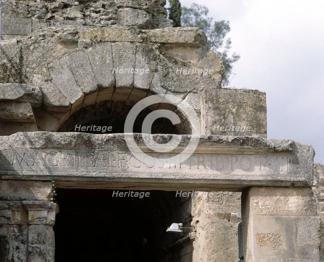 Roman Theatre of Mérida, founding date on the entrance arch of one of the 'Parodos' in times of M…