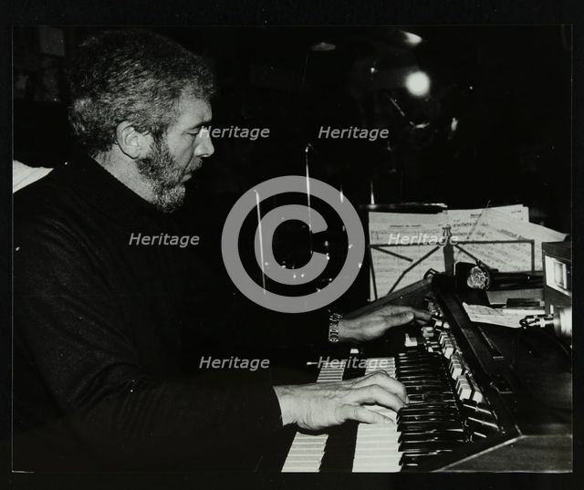 Ron Lohn playing the electronic organ at The Bell, Codicote, Hertfordshire, 22 February 1981. Creator: Denis Williams.