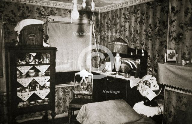 Room within a New York tenement block, USA, early 1930s.  Creator: Unknown.