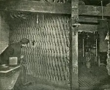 Rope Screen Used For Protection While Pressing Explosive Gun-Cotton 1901. Creator: Unknown