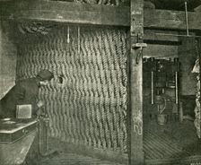 Rope Screen Used For Protection While Pressing Explosive Gun-Cotton 1901. Creator: Unknown