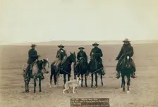 Roping gray wolf, Cowboys take in a gray wolf on "Round up," in Wyoming, 1887. Creator: John C. H. Grabill