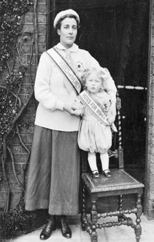 Rose Lamartine Yates wearing the suffragette uniform, with her son Paul, Surrey, c1910