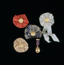 Rosette badges given by Harold W Pierce with Royal and Ancient Golf Club buttons in rosette badges