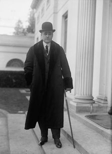 Raymond T. Baker, U.S. Mint, 1917. Creator: Harris & Ewing