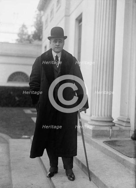 Raymond T. Baker, U.S. Mint, 1917. Creator: Harris & Ewing.
