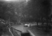 Raymond Mays 4500 cc Invicta competing in the Shelsley Walsh Speed Hill Climb, Worcestershire. Artist: Bill Brunell
