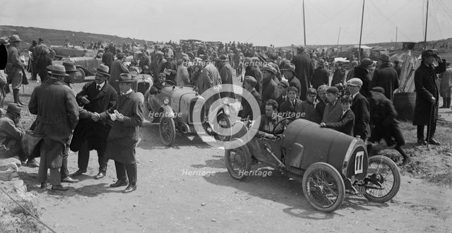 Raymond Mays' Bugatti Brescia and JS Chance's Enfield Allday, Porthcawl Speed Trials, Wales, 1922. Artist: Bill Brunell.