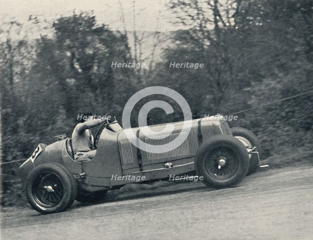 'Raymond Mays (E.R.A.) breaking the record, 1935; the Shelsey Walsh Hill Climb', 1937. Artist: Unknown.