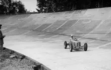 Raymond Mays ERA on the way to second place, JCC International Trophy, Brooklands, 7 May 1938. Artist: Bill Brunell