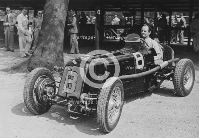 Raymond Mays in his 1.5 litre ERA, Donington,1937. Artist: Unknown