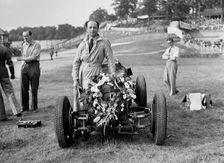 Raymond Mays with his ERA at Brooklands, Surrey, 1936. Artist: Bill Brunell