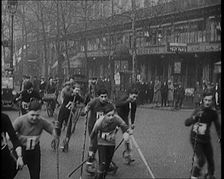 Racers Skiing Through Paris, France on Wheeled Skis, 1929. Creator: British Pathe Ltd