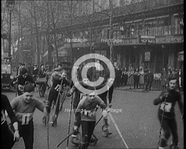Racers Skiing Through Paris, France on Wheeled Skis, 1929. Creator: British Pathe Ltd.