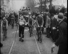 Racers Skiing Through Paris, France on Wheeled Skis, 1929. Creator: British Pathe Ltd