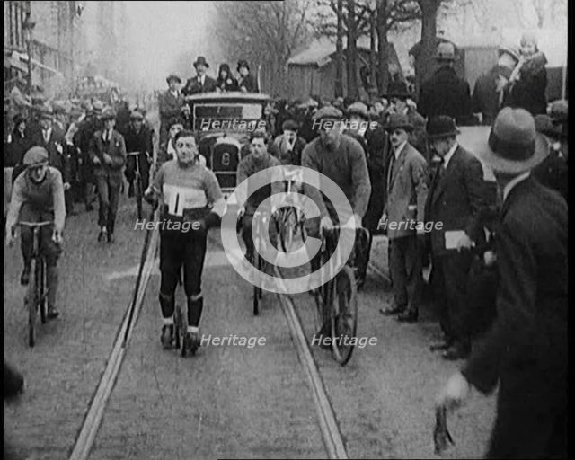 Racers Skiing Through Paris, France on Wheeled Skis, 1929. Creator: British Pathe Ltd.