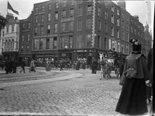 Racine Watch and clock makers building established 1833 (Ireland), 1895. Creator: Robert Augustus Henry L'Estrange