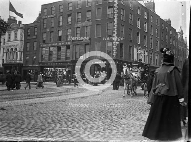 Racine Watch and clock makers building established 1833 (Ireland), 1895. Creator: Robert Augustus Henry L'Estrange.