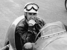Racing driver Ken McAlpine. Creator: Unknown