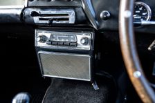 Radio in a 1961 Aston Martin DB4 GT SWB lightweight. Creator: Unknown