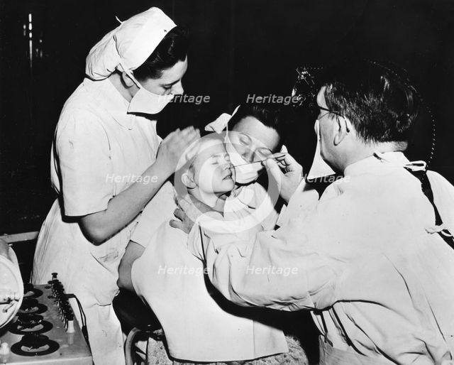Radium treatment to cure a nasal infection, France, c1947-1951. Artist: Unknown