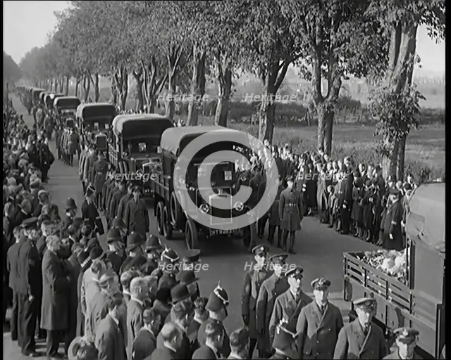 RAF Officers and Male Civilians Taking Part in a Funeral Parade for the Dead Crew of the..., 1930. Creator: British Pathe Ltd.
