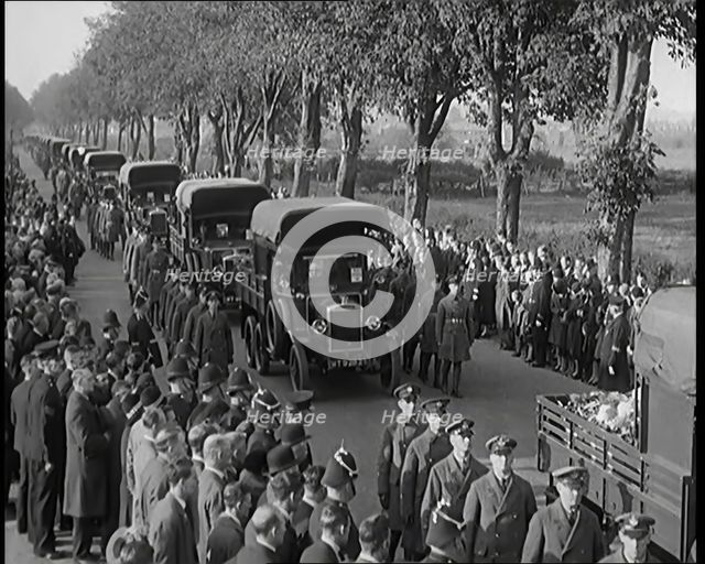 RAF Officers and Male Civilians Taking Part in a Funeral Parade for the Dead Crew of the..., 1930. Creator: British Pathe Ltd.