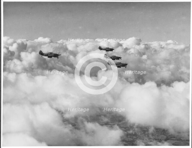 RAF Film Production Unit film still showing a 'hurribomber' in flight, 1942. Creator: Royal Air Force Fim Production Unit.