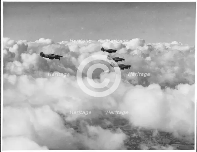 RAF Film Production Unit film still showing a 'hurribomber' in flight, 1942. Creator: Royal Air Force Fim Production Unit.