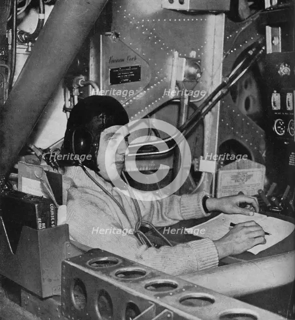 RAF flight engineer on board an aircraft, c1940 (1943). Artist: Unknown.