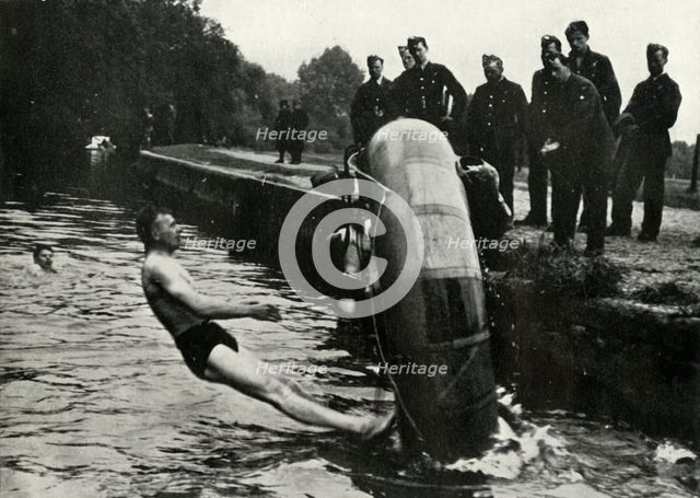 RAF personnel learning to use a dinghy, 1941.  Creator: Charles Brown.